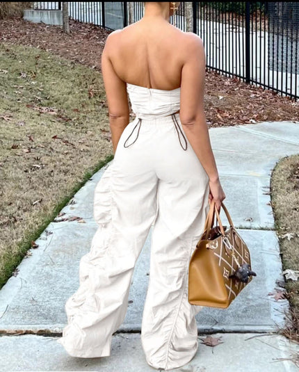 White strapless jumpsuit with ruched bodice, drawstring waist, wide-leg pants