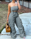 Grey strapless jumpsuit with ruched bodice, drawstring waist, wide-leg pants
