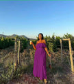 Off-shoulder purple maxi dress with ruffle trim at bust and tiered skirt