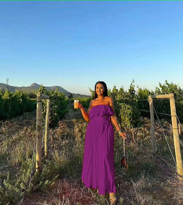 Off-shoulder purple maxi dress with ruffle trim at bust and tiered skirt