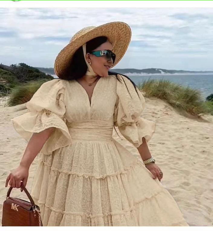 Beige tiered midi dress with puff sleeves and V-neck bodice