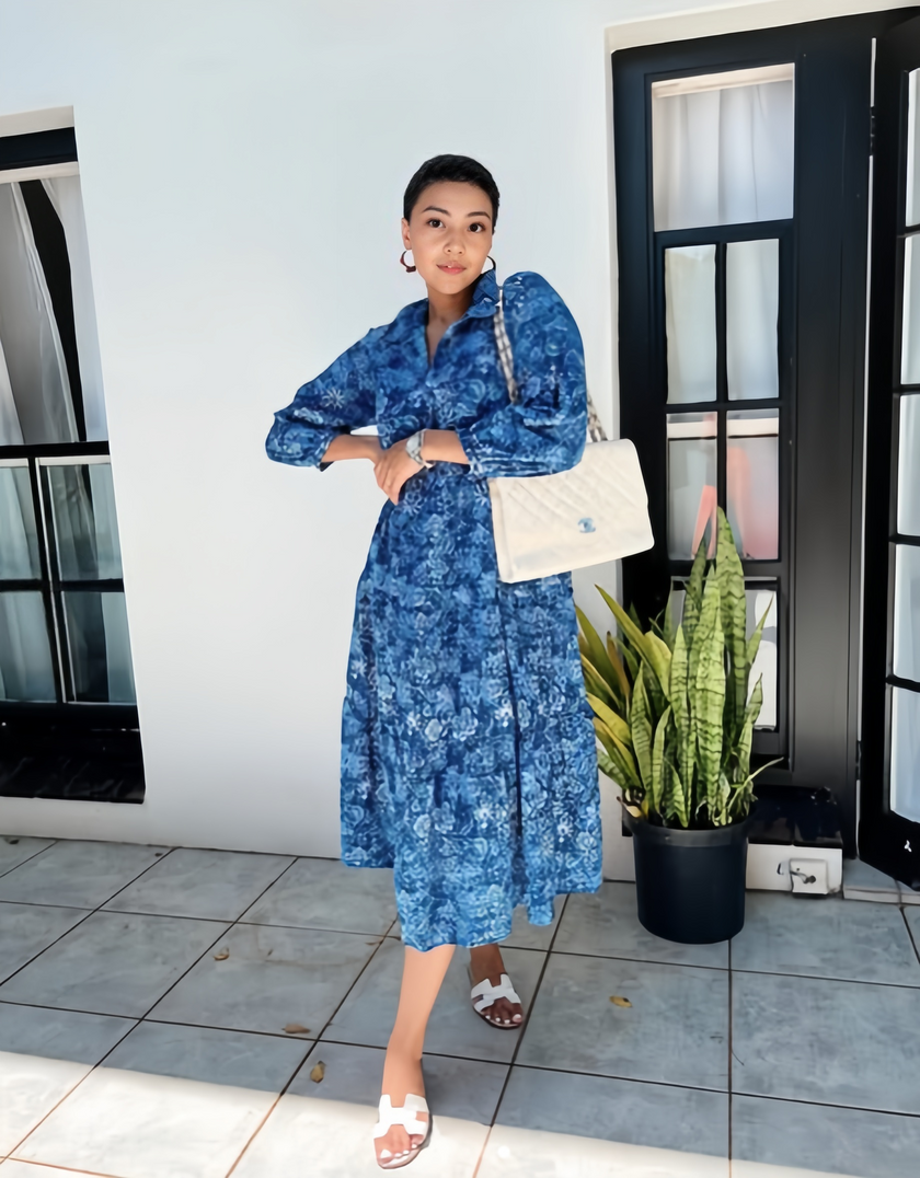 Blue printed long sleeve dress with tailored waist, V-neck and midi length.