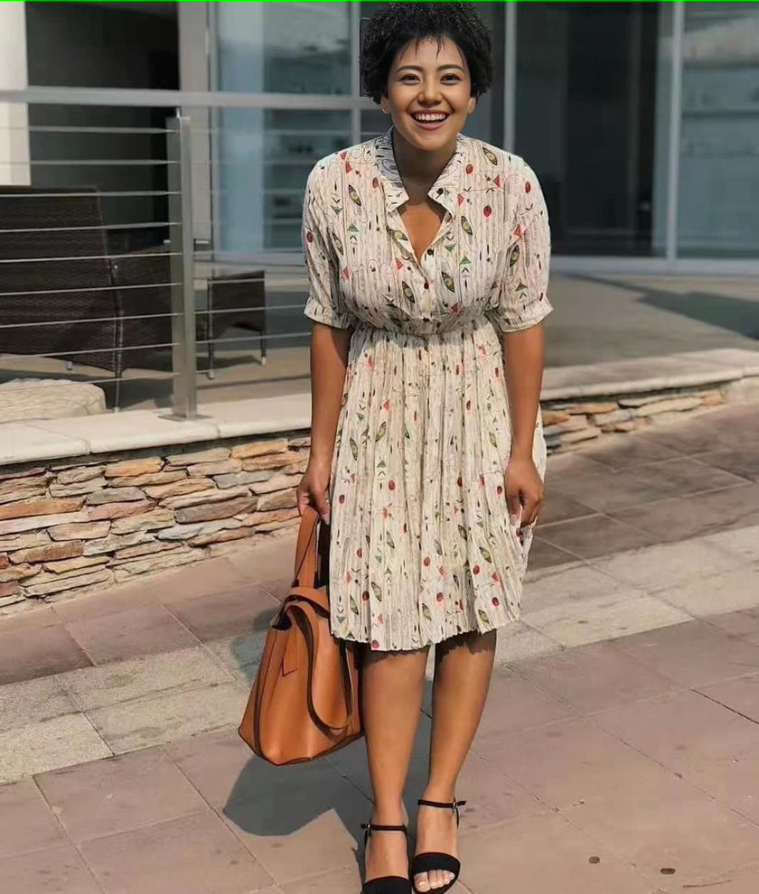 Floral pleated midi dress with V-neck and waist tie, cream with red flowers