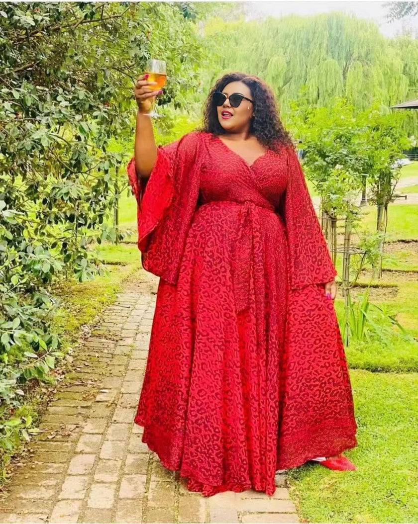 Plus size maxi dress with billowy sleeves, red textured print, V-neck bodice