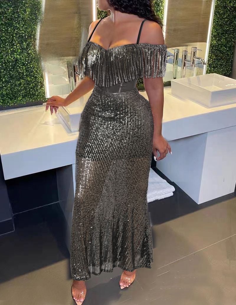 Black mermaid maxi dress with off-shoulder sequins and fringe sleeves, flared hem