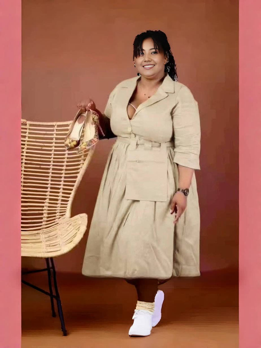 Tan belted midi dress with pointed collar, V-neck, and three-quarter sleeves