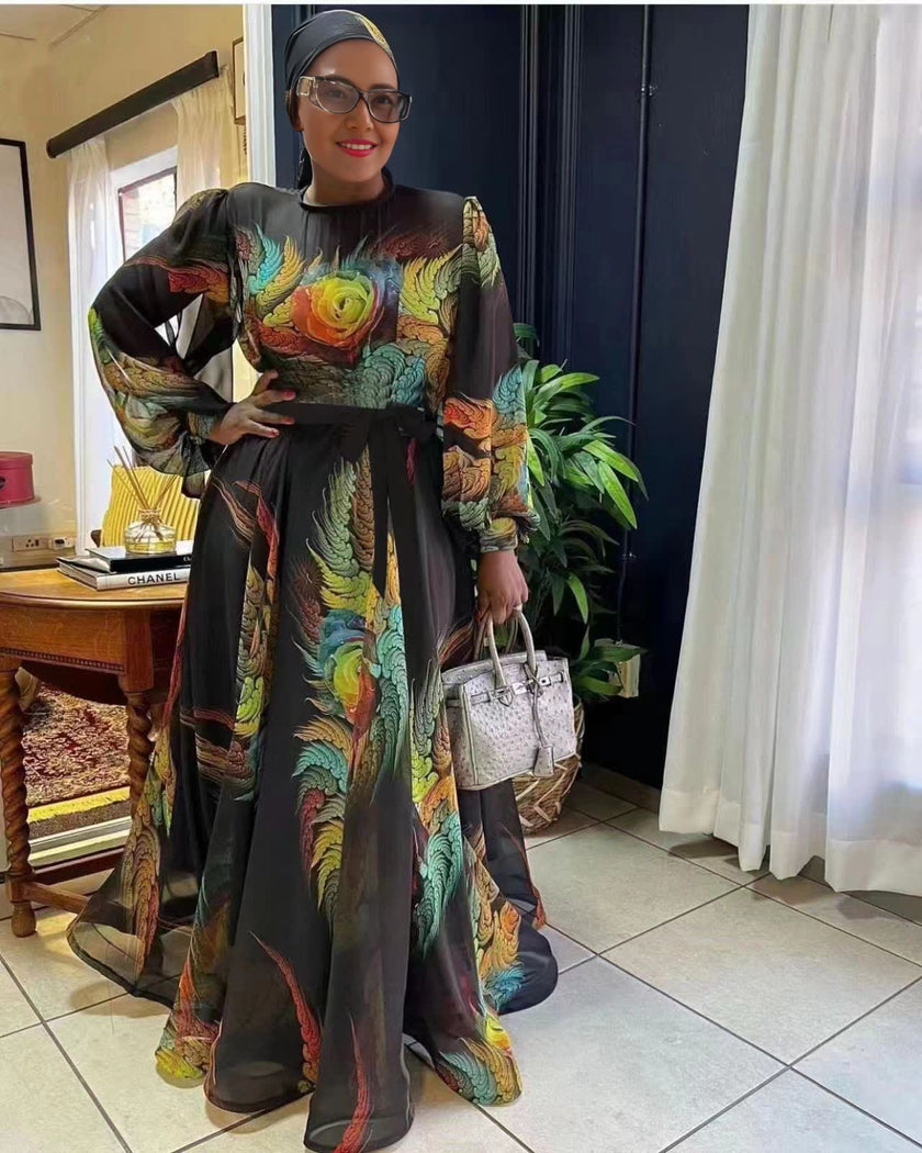 Floral maxi dress with fitted waist and puff sleeves, long flowing skirt, multicolor print