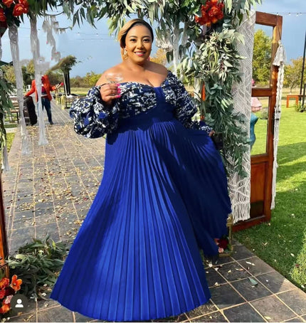 Blue off-shoulder pleated maxi dress with long puff sleeves, gathered bodice