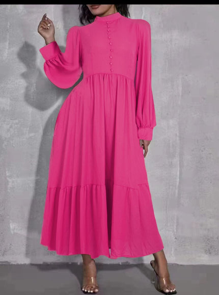 Deep-pink midi dress with puff sleeves, tiered skirt, and button front