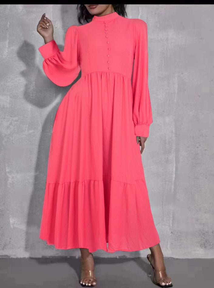 Hot-pink midi dress with puff sleeves, tiered skirt, and button front