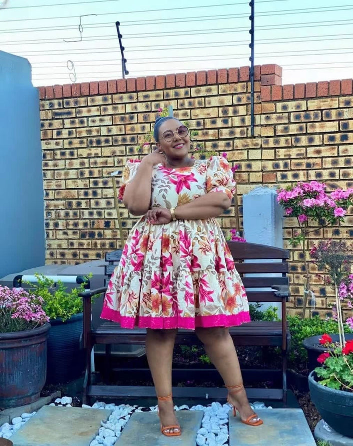 Floral puff sleeve mini dress with stretch waist, pink floral print on light base