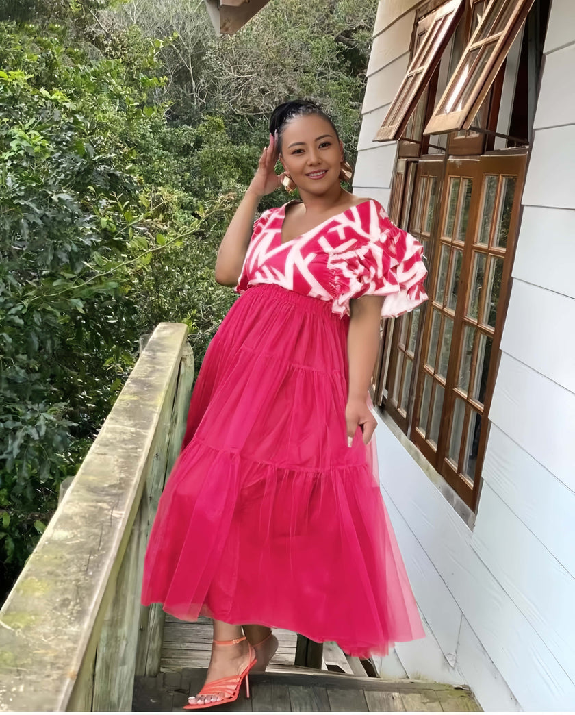 Deep-pink tiered tulle maxi dress with puff sleeves and patterned V-neck bodice