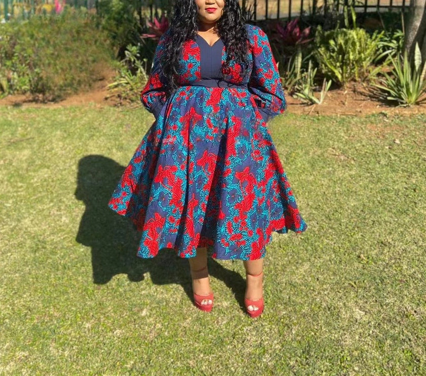 Plus size printed midi dress with puff sleeves, navy blue and red floral pattern, V-neck