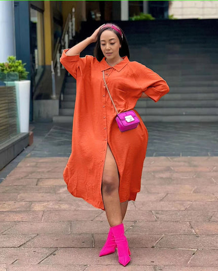 Orange-red hooded midi shirt dress with front buttons and side slit, oversized fit
