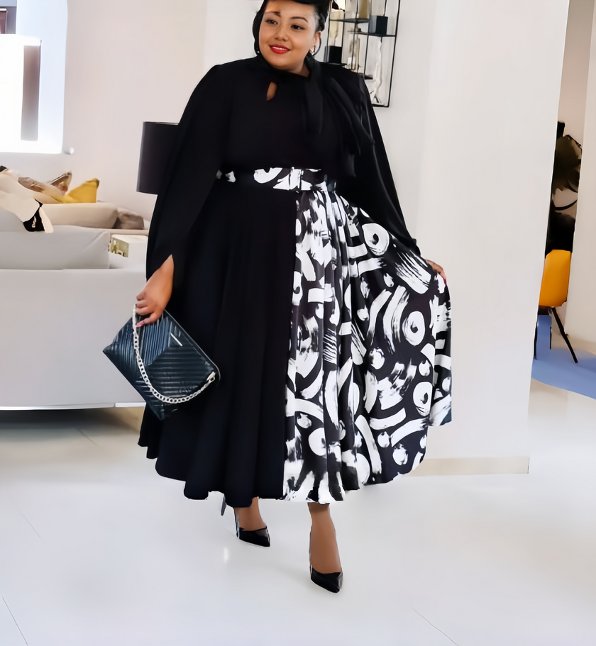 Black midi patchwork dress with white abstract print skirt and flared sleeves