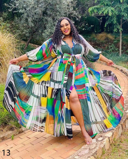 Plus size maxi dress with pleated skirt, wide belt, multicolor geometric print