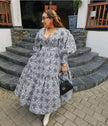 Geometric print midi dress with V-neck and puff sleeves, black-and-white
