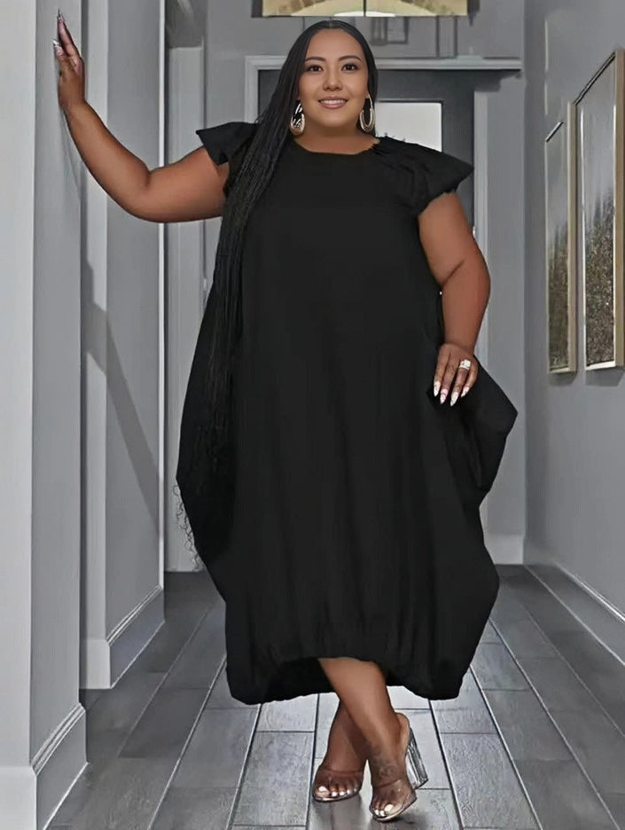 Black midi dress with ruffle cap sleeves and loose A-line silhouette