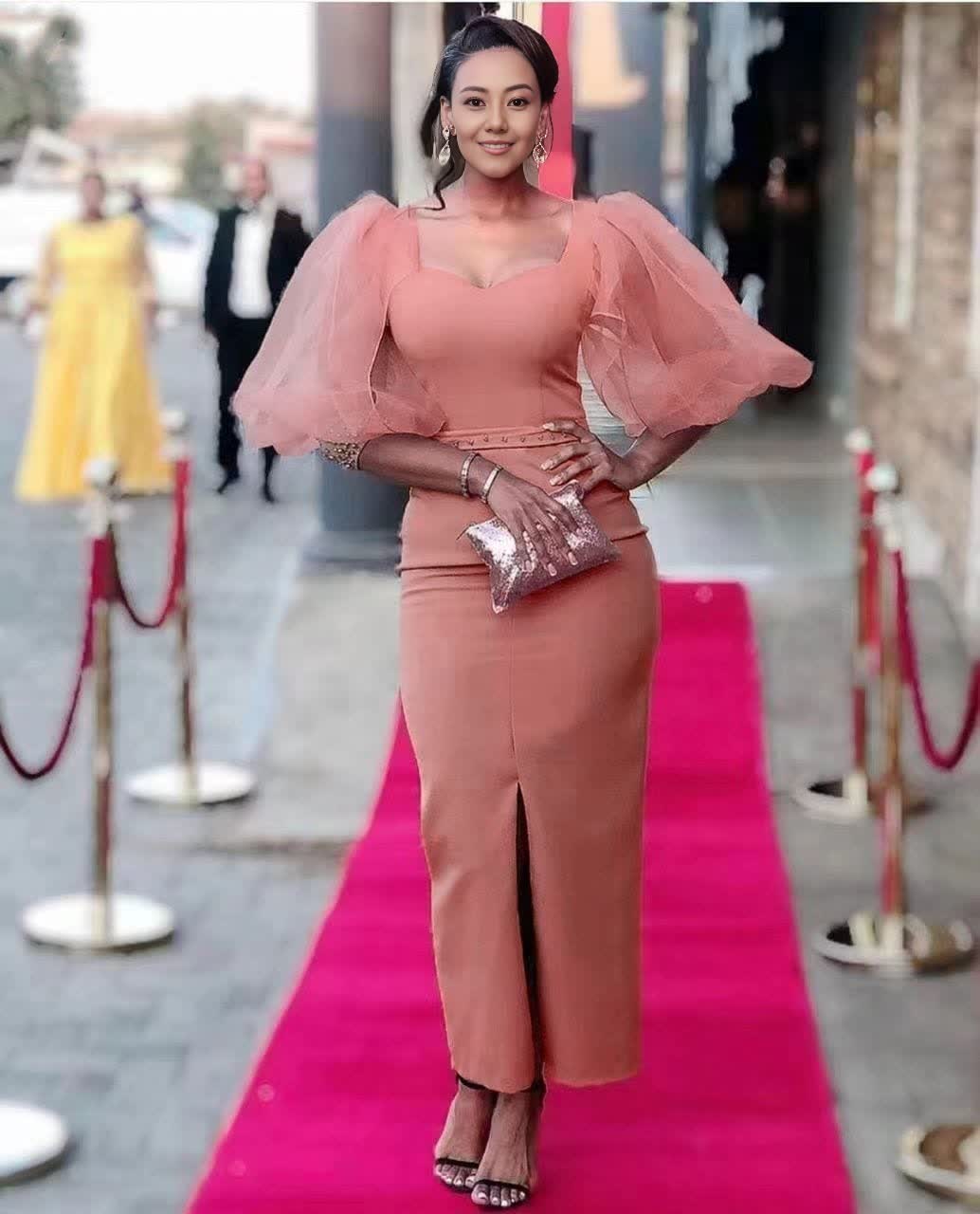 Light-pink midi evening dress with square neckline and voluminous puff sleeves