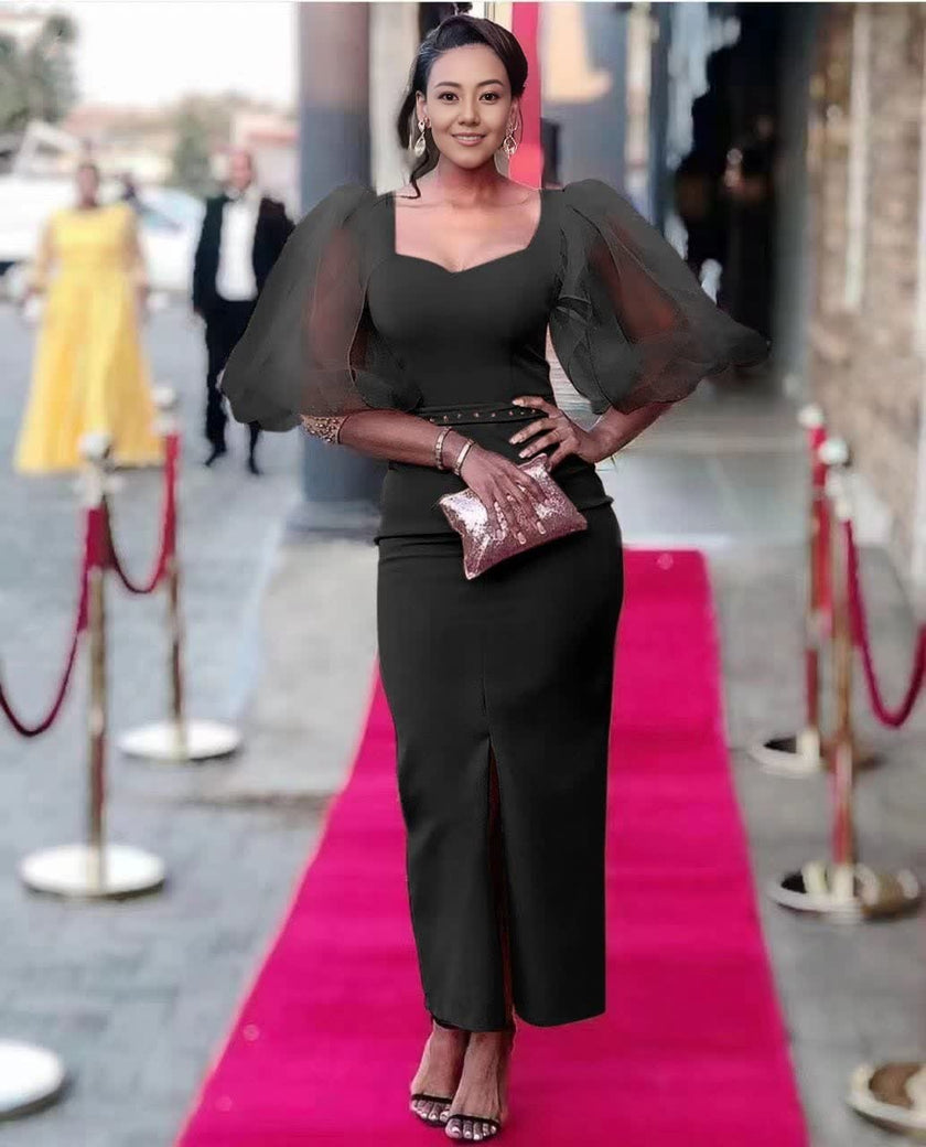 Black midi evening dress with square neckline and sheer puff sleeves