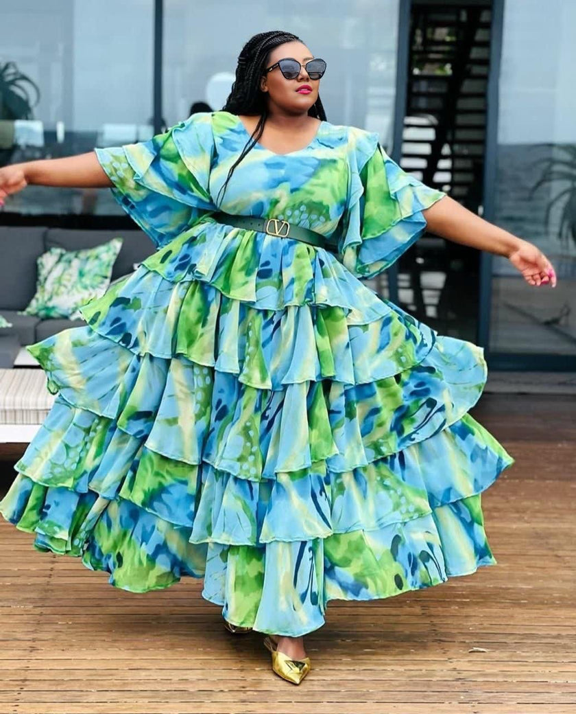 Tiered maxi dress with puff sleeves, blue-green floral print and waist belt
