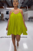 Sleeveless flared dress in green-yellow with thin straps and V neckline