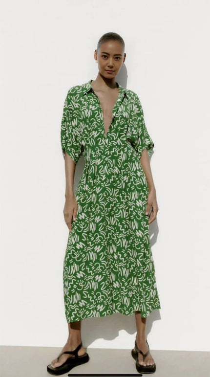 Green printed tie-waist A-line midi dress with V-neck and short puff sleeves