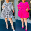 Printed mini dress with puff sleeves; black-and-white pattern and bright pink variant