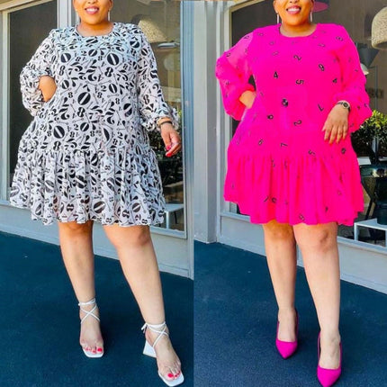 Plus size mini dress with puff sleeves and allover graphic print, tiered skirt