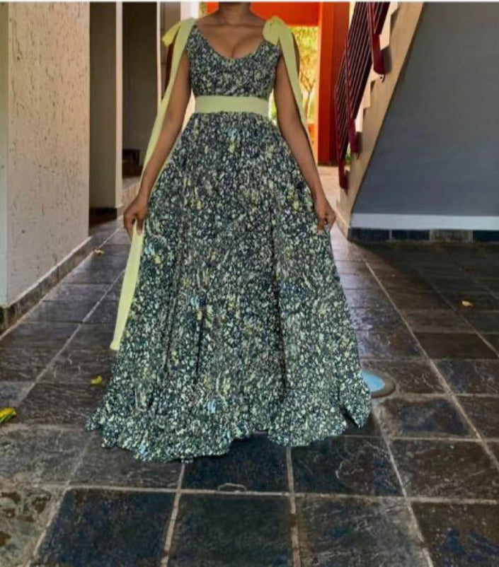 Plus size maxi dress, sleeveless, ruffled floral bodice, gathered skirt