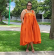 Orange off-shoulder ruffle hem dress with sleeveless gathered bodice
