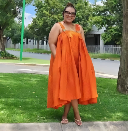 Orange off-shoulder ruffle hem dress with sleeveless gathered bodice