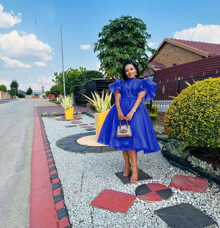 Blue puff-sleeve midi dress with flared skirt and gathered bodice