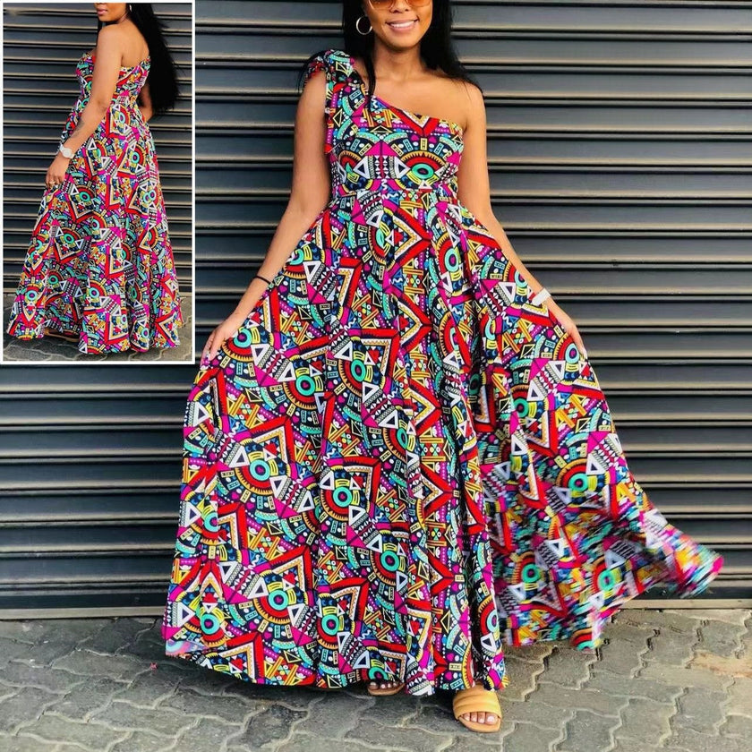One-shoulder A-line maxi dress, sleeveless, vibrant geometric African print, multicolor