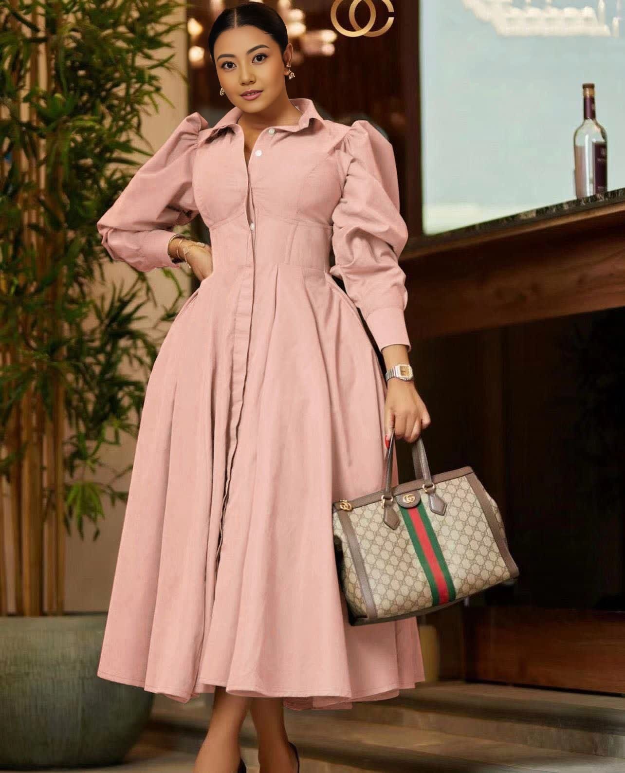 Light-pink midi A-line dress with puff sleeves, pleated skirt, front zipper