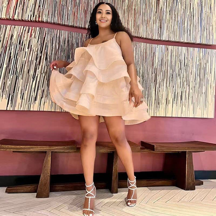 Peach ruffle tiered mini dress with adjustable spaghetti straps
