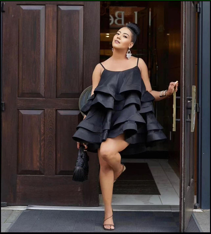 Black ruffle tiered mini dress with adjustable spaghetti straps