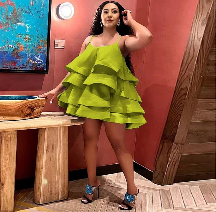 Green ruffle tiered mini dress with adjustable spaghetti straps