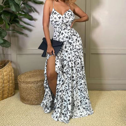 Floral maxi dress with spaghetti straps and front slit, white base with fitted bodice