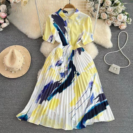 Pleated midi shirt dress with abstract print, yellow, blue and white, short sleeves