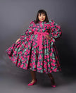 Plus size floral puff-sleeve midi dress with pink bow, dark green and magenta blossoms