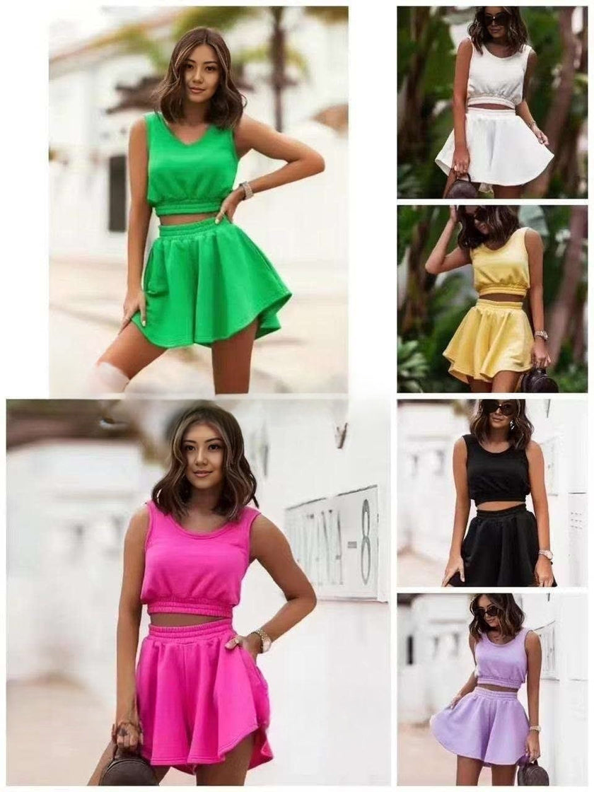 Sleeveless cropped top and pleated mini skirt set styling in multiple colors