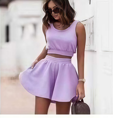 Lavender sleeveless cropped top and pleated mini skirt set with elastic waist