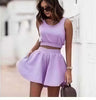 Lavender sleeveless cropped top and pleated mini skirt set with elastic waist