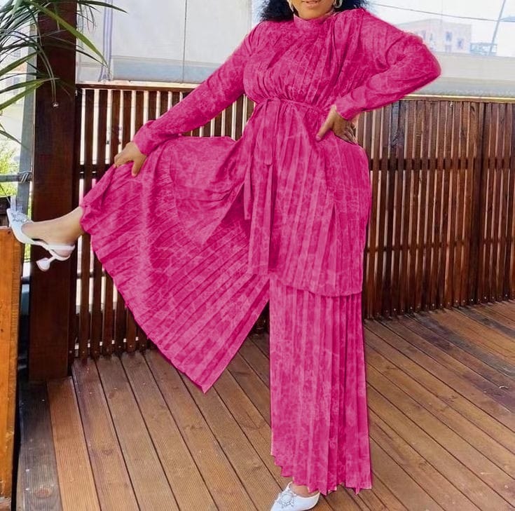 Hot-pink pleated twin set with belted long tunic and wide-leg pants, long sleeves