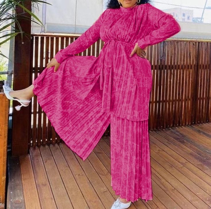 Hot-pink pleated twin set with belted long tunic and wide-leg pants, long sleeves