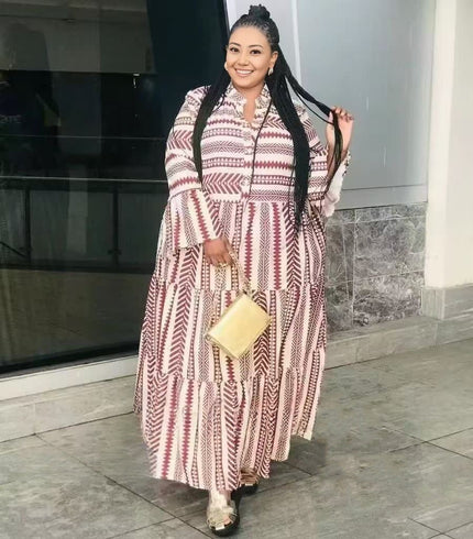 Plus size geometric tiered maxi dress in red and cream, long sleeve, tiered skirt
