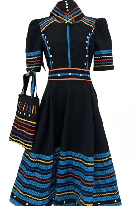 Black geometric beaded midi dress with colorful striped trim and beaded neckline