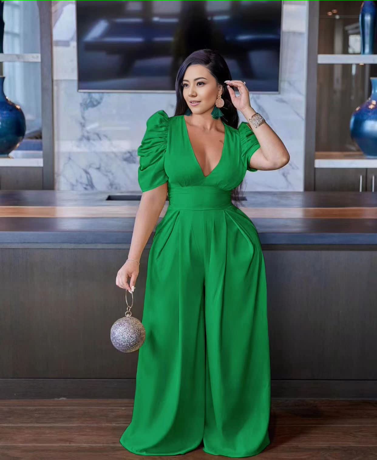 Green puff-sleeve V-neck wide-leg jumpsuit with gathered waist