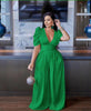 Green puff-sleeve V-neck wide-leg jumpsuit with gathered waist